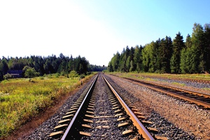 Railway Tracks Amidst Rocky Landscape