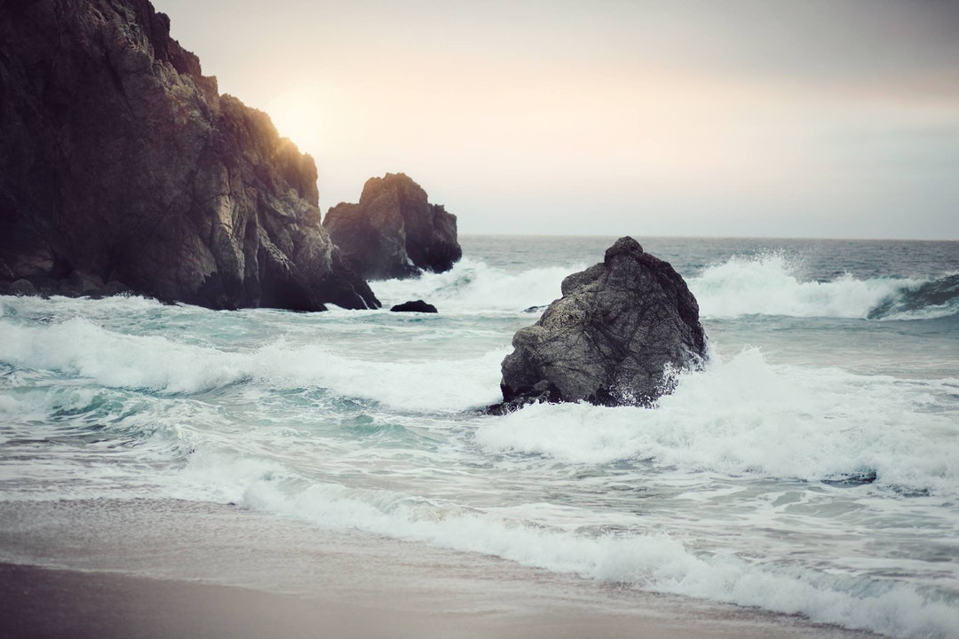 Powerful Waves Against Rocks