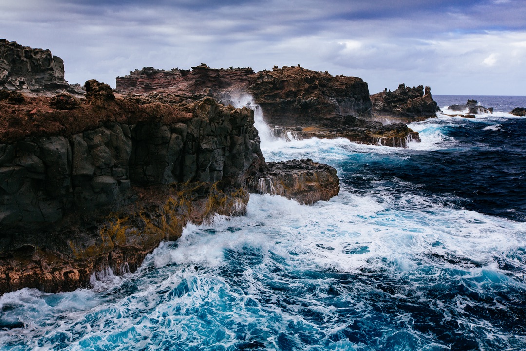 Waves Crashing Against Rocky Shores